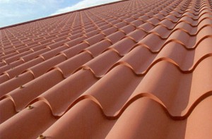 Pannello coibentato a forma di coppo